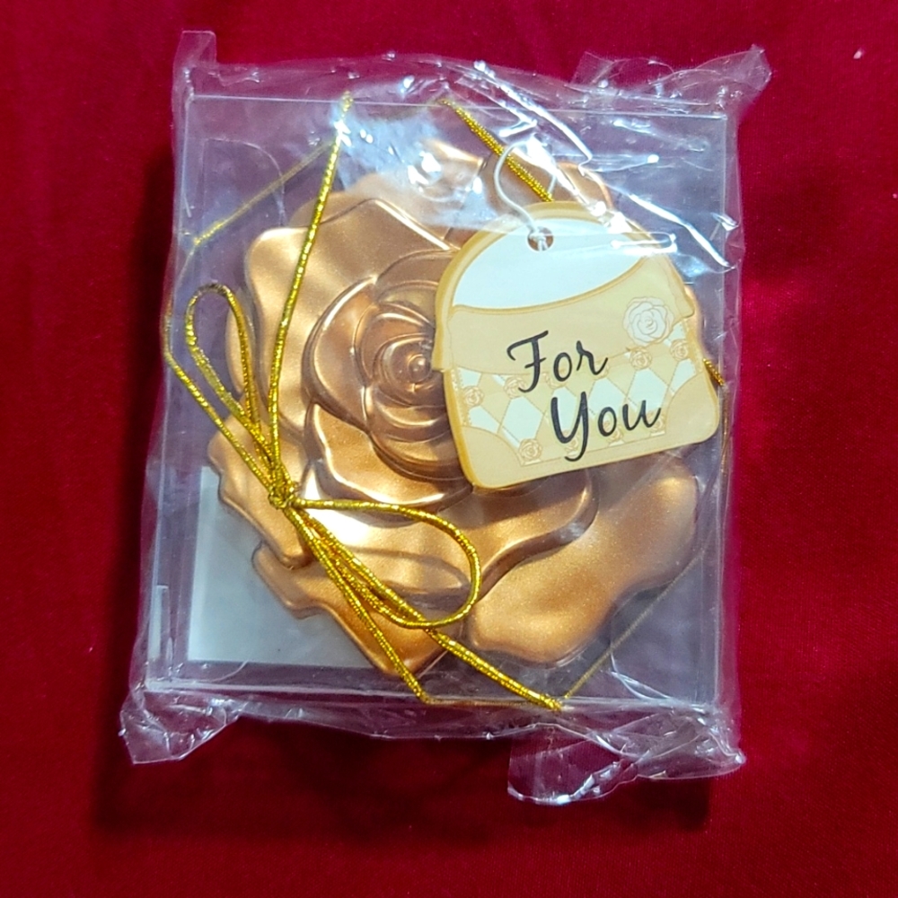 Gold rose plastic mirror. Beautiful.
